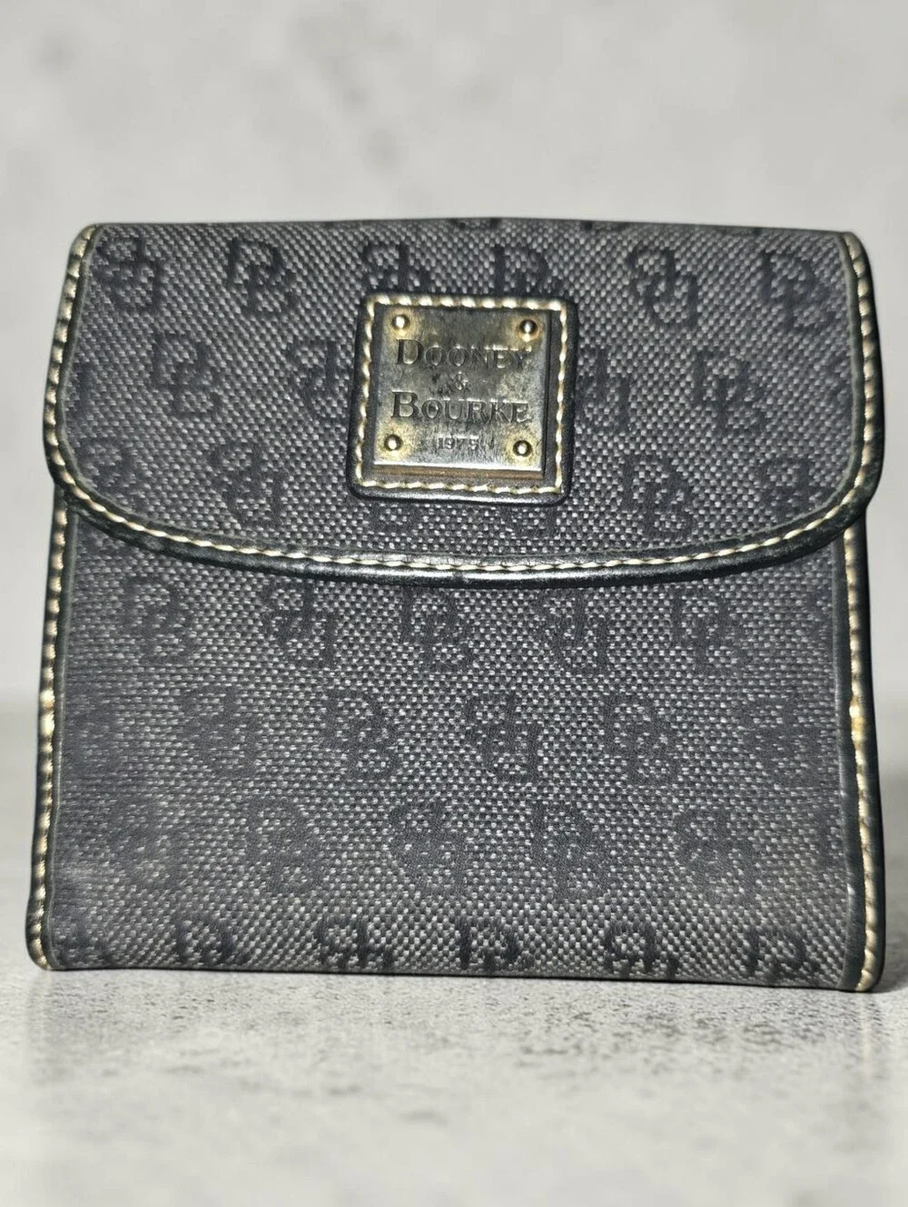 EUC Dooney & Bourke Black Logo Compact Wallet with Gold Plaque